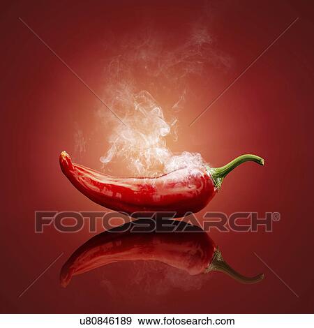 Red chilli with smoke against red background View Large Photo Image Stock Photo - Red chilli with smoke against red background. Fotosearch