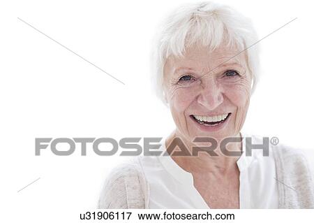 Senior woman smiling towards camera View Large Photo Image Stock Photo - Senior woman smiling towards camera. Fotosearch