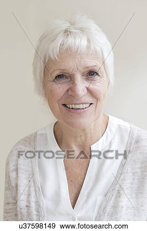 Stock Photo - Senior woman smiling towards camera. Fotosearch
