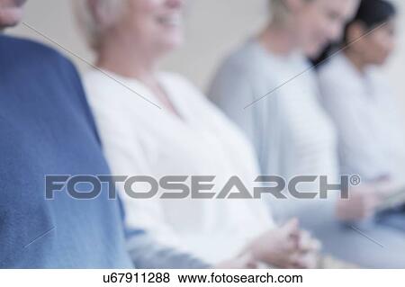 Small group of people, defocused View Large Photo Image Stock Photo - Small group of people, defocused. Fotosearch