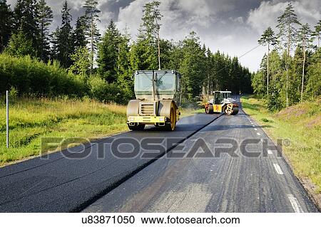 Steamrolling and asphalting View Large Photo Image Stock Image - Steamrolling and asphalting. Fotosearch