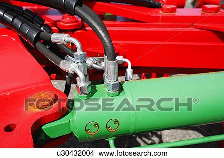 Picture - Tractor hydraulics. Fotosearch