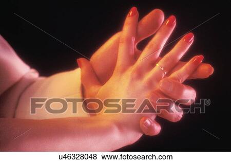Two people holding hands, dancing View Large Photo Image Stock Photo - Two people holding hands, dancing. Fotosearch