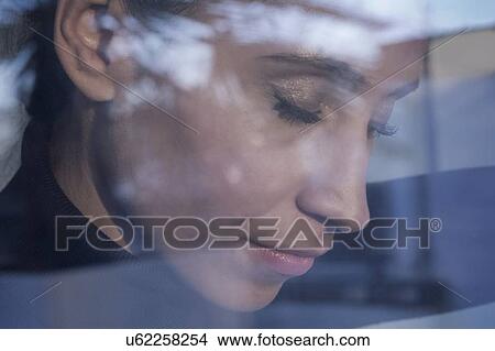 Woman day dreaming View Large Photo Image Picture - Woman day dreaming. Fotosearch