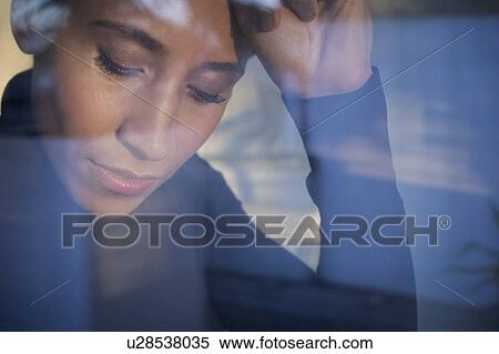Stock Photography - Woman day dreaming. Fotosearch