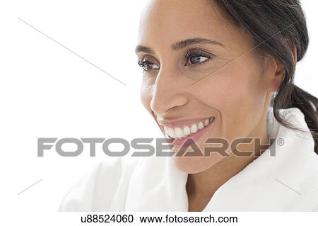 Woman smiling and looking away View Large Photo Image Stock Image - Woman smiling and looking away. Fotosearch