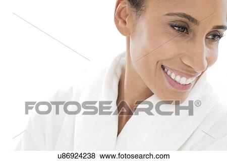 Stock Photo - Woman smiling and looking away. Fotosearch