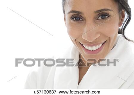 Stock Photo - Woman smiling towards camera. Fotosearch