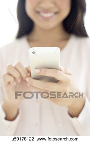 Woman using smartphone View Large Photo Image Stock Image - Woman using smartphone. Fotosearch
