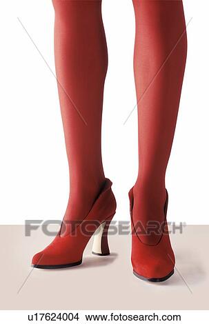 Woman wearing red tights and high heels View Large Photo Image Picture - Woman wearing red tights and high heels. Fotosearch