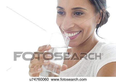 Stock Image - Woman with glass of water. Fotosearch