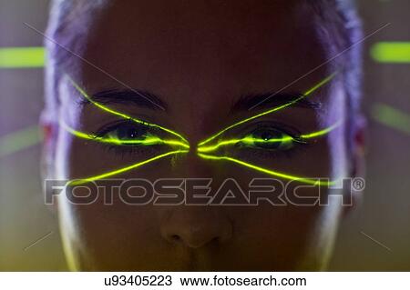 Woman with green lights on face View Large Photo Image Stock Image - Woman with green lights on face. Fotosearch
