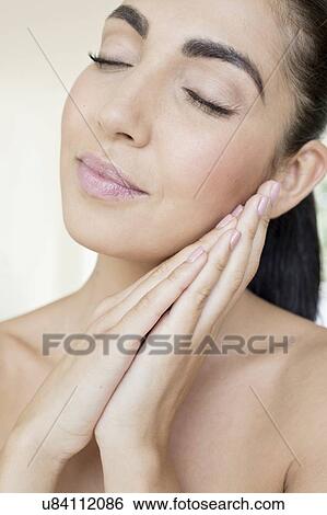 Woman with hands together View Large Photo Image Stock Photograph - Woman with hands together. Fotosearch