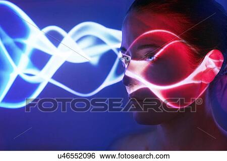 Woman with lights on face View Large Photo Image Stock Photograph - Woman with lights on face. Fotosearch