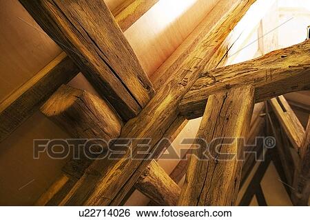 Stock Photograph - Wooden beams and rafters. Fotosearch
