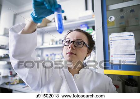 Stock Photo - Female scientist in laboratory. Fotosearch