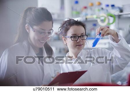 Stock Image - Female scientists in laboratory. Fotosearch