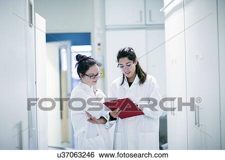 Female scientists in laboratory View Large Photo Image Stock Photograph - Female scientists in laboratory. Fotosearch