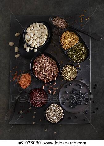 Stock Image - Pulses in bowls. Fotosearch