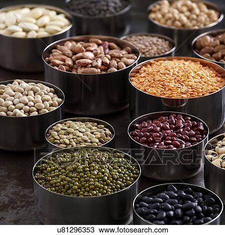 Stock Image - Pulses in metal bowls. Fotosearch