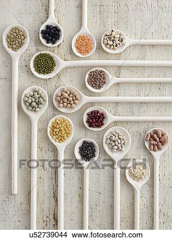 Pulses on wooden spoons View Large Photo Image Picture - Pulses on wooden spoons. Fotosearch