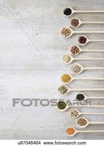Pulses on wooden spoons View Large Photo Image Picture - Pulses on wooden spoons. Fotosearch