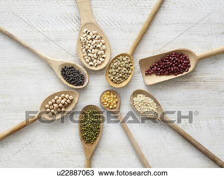 Pulses on wooden spoons View Large Photo Image Stock Image - Pulses on wooden spoons. Fotosearch