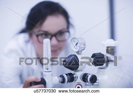 Stock Image - Radiologist checking equipment. Fotosearch