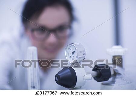 Radiologist checking equipment View Large Photo Image Stock Photo - Radiologist checking equipment. Fotosearch