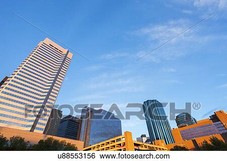 Stock Photograph - Canada, Alberta, Edmonton, Blue sky over skyscrapers. Fotosearch