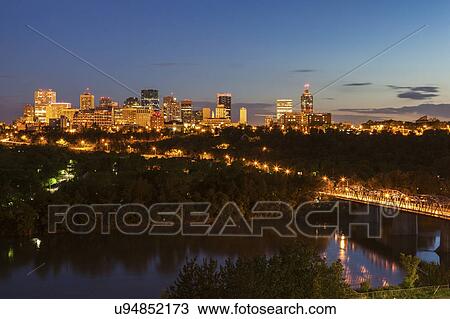Stock Image - Canada, Alberta, Edmonton, Cityscape at dusk. Fotosearch