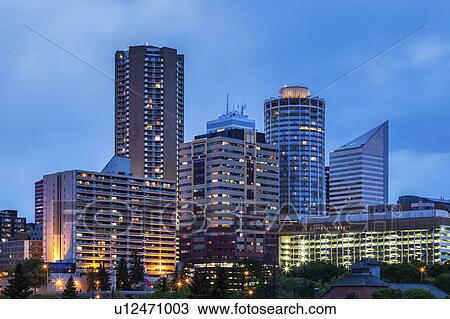 Stock Image - Canada, Alberta, Edmonton, Financial district at dusk. Fotosearch