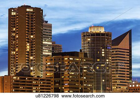 Canada, Alberta, Edmonton, Skyscrapers against moody sky View Large Photo Image Stock Photo - Canada, Alberta, Edmonton, Skyscrapers against moody sky. Fotosearch