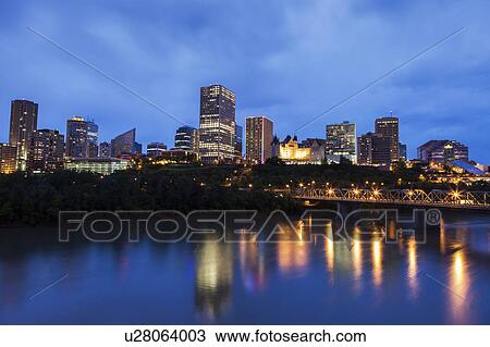 Stock Image - Canada, Alberta, Edmonton, Waterfront at dusk. Fotosearch