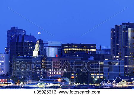 Stock Image - Canada, Nova Scotia, Halifax, City at dusk. Fotosearch