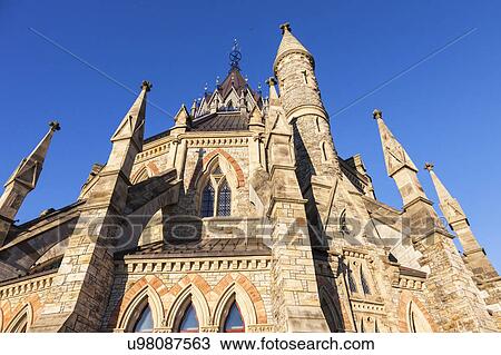 Stock Image - Canada, Ontario, Ottawa, Library of parliament against clear sky. Fotosearch