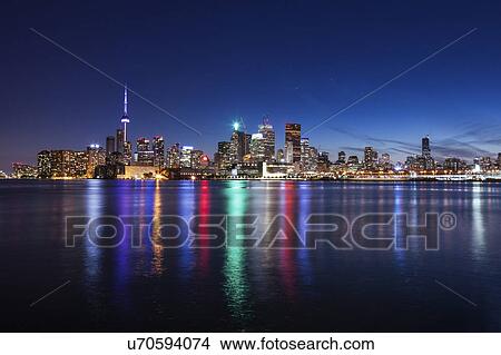 Canada, Ontario, Toronto, City reflecting in water View Large Photo Image Picture - Canada, Ontario, Toronto, City reflecting in water. Fotosearch