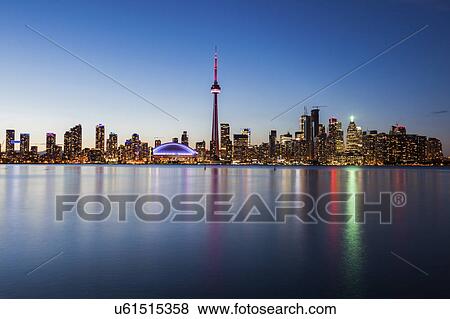 Canada, Ontario, Toronto, Modern city reflected in water View Large Photo Image Stock Photo - Canada, Ontario, Toronto, Modern city reflected in water. Fotosearch