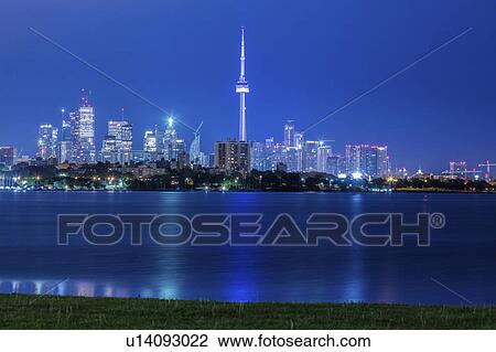 Canada, Ontario, Toronto, Town seen over water View Large Photo Image Stock Image - Canada, Ontario, Toronto, Town seen over water. Fotosearch