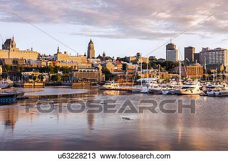 Canada, Quebec, Quebec City, city reflecting in water View Large Photo Image Stock Image - Canada, Quebec, Quebec City, city reflecting in water. Fotosearch