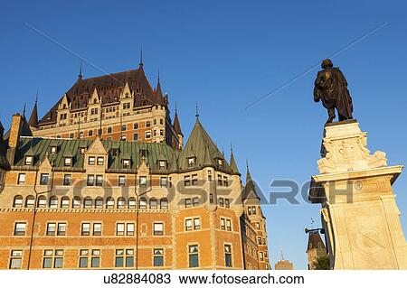 Stock Image - Canada, Quebec, Quebec City, Old architecture with statue. Fotosearch
