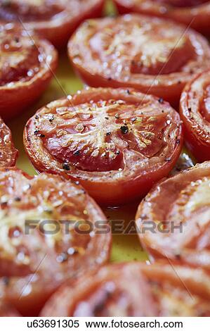 Cooked tomatoes in olive oil View Large Photo Image Stock Photography - Cooked tomatoes in olive oil. Fotosearch
