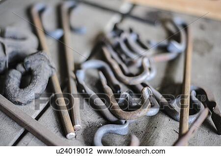 Stock Image - Craft products sitting on wooden table. Fotosearch