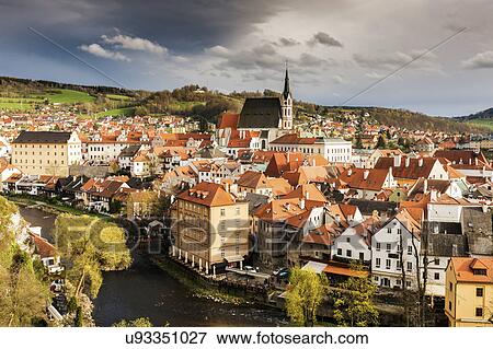 Stock Photo - Czech Republic, South Bohemia, Cesky Krumlov, Storm clouds above old town. Fotosearch