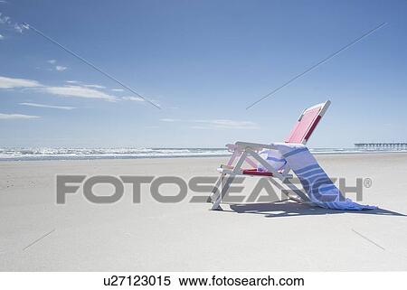 Deckchair on empty beach View Large Photo Image Stock Photography - Deckchair on empty beach. Fotosearch