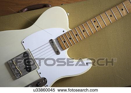 Stock Photography - Fender Telecaster lying on guitar case. Fotosearch