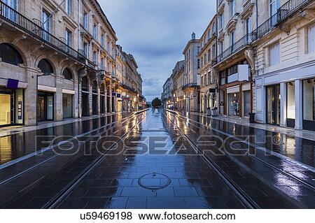 Stock Photo - France, Nouvelle-Aquitaine, Bordeaux, Street in old town. Fotosearch