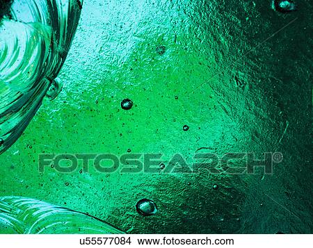 Picture - Green backlit glass. Fotosearch