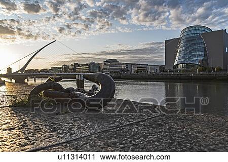 Stock Image - Ireland, Dublin, River Lifley with docklands area. Fotosearch