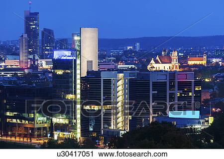 Stock Image - Lithuania, Vilnius, Cityscape at night. Fotosearch